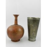 A Persian earthenware baluster vase, hav