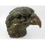 A tabletop bronze study of an eagle head