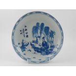 A Chinese blue and white plate, depictin