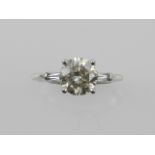 An 18ct white gold diamond mounted solitaire dress ring, set with brilliant cut diamond of approx.