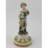 A Capodimonte ceramic figurine of a boy,