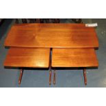 A teak nest of tables, the rectangular t