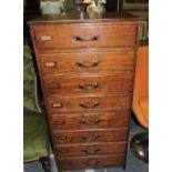 A 20th century oak eight drawer cabinet,
