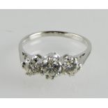 An 18ct white gold three-stone diamond r