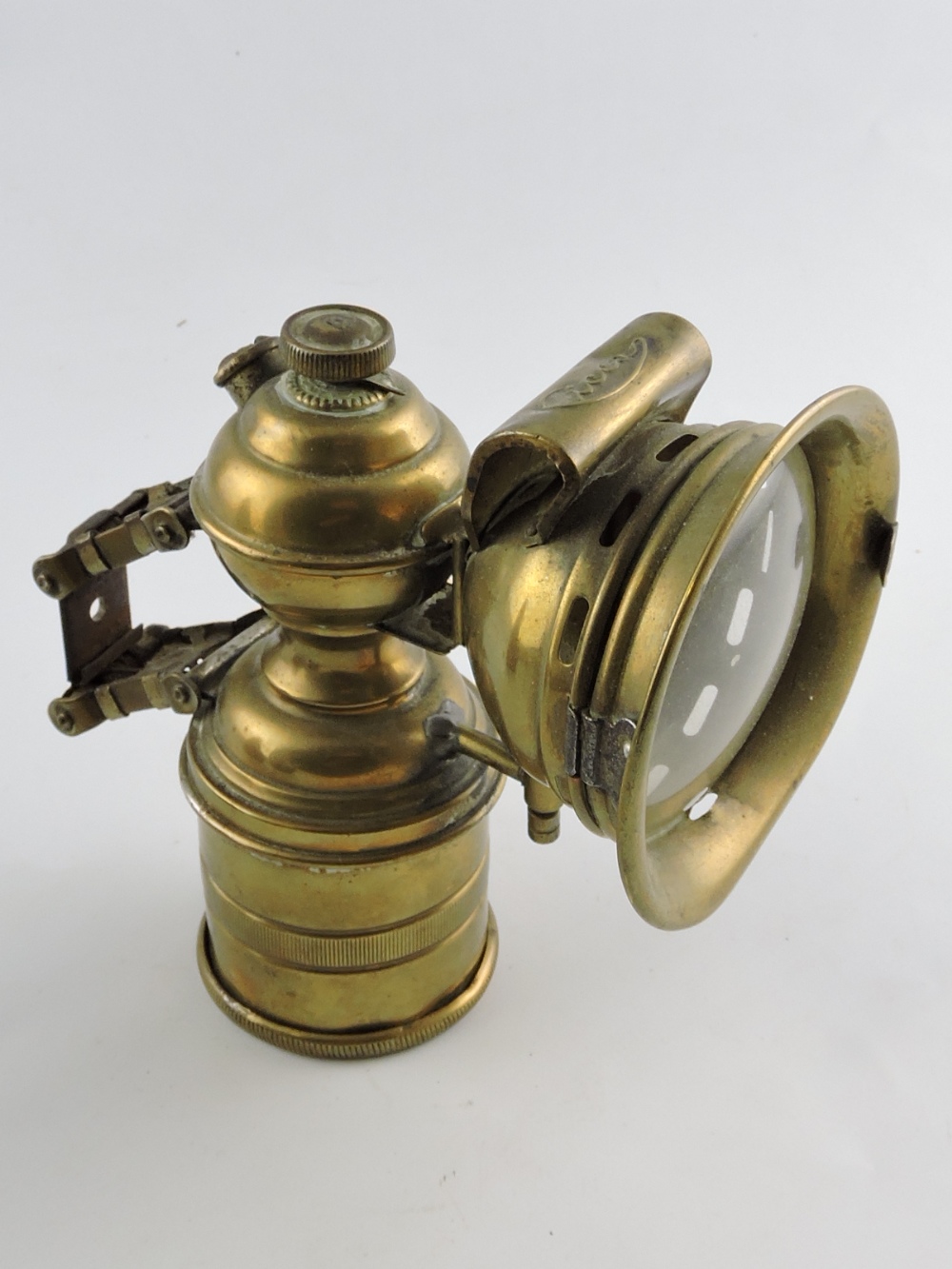 An early 20th century brass acetylene cy