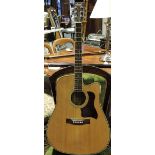 An acoustic guitar by Woods Instruments,