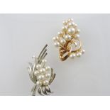 A pearl and yellow metal brooch, stylise