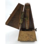 A walnut cased metronome by de Maelzel,