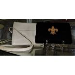 A black velvet envelope clutch bag, with