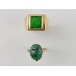 A gentleman's green hardstone signet rin