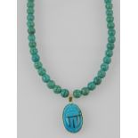 An Egyptian 18ct gold mounted turquoise