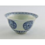 A late 19th century blue and white bowl,