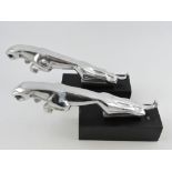 A pair of cast aluminium Jaguar car masc