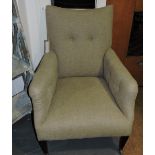 An Edwardian armchair upholstered in a b