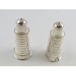 A pair of silver-plated salt and pepper