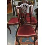 A set of four Edwardian mahogany dining