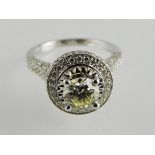 An 18ct white gold diamond cluster ring,