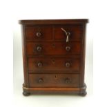 A Victorian mahogany miniature chest, ha