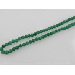 A green hardstone beaded necklace, with