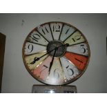 A novelty decorative wall clock with Ara