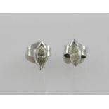 A pair of white metal diamond ear studs,