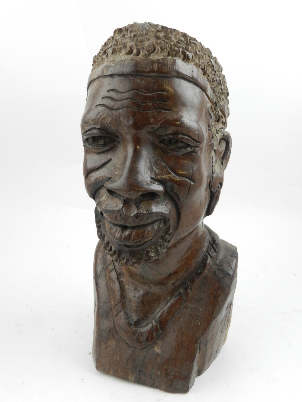 An African caved wooden head and shoulde