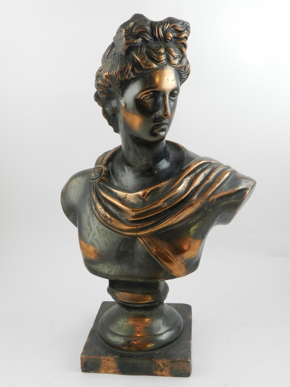 A spelter bust of a classical figure, H.