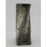 An early 20th century white metal vase,