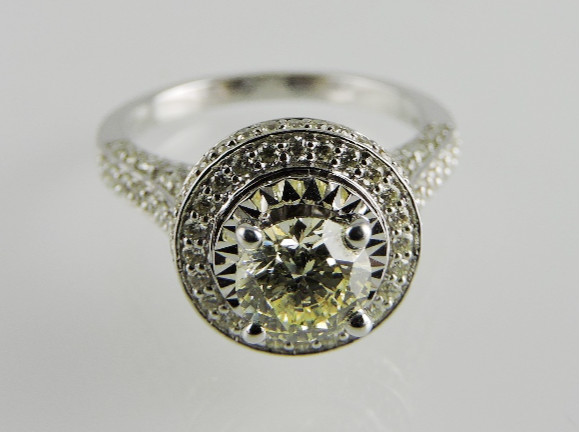 An 18ct white gold diamond cluster ring, - Image 8 of 11