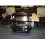 A late Victorian ebonised mirrored three