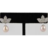 A pair of pink pearl and diamond set ear