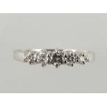 A five stone diamond ring, approx 0.25ct