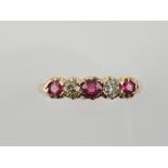 A ruby and diamond set dress ring, in a