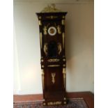 A French Third Empire mahogany pier clock, gilt metal mounted, with moulded cornice surmounted by an