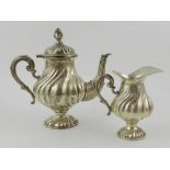 A Continental bachelor tea silver set in the Queen Anne style, having writhen design, approx H.15cm