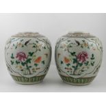 A pair of Chinese porcelain crackle glazed vases,decorated with vignettes of birds and flowers,