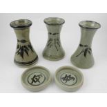 Three pottery vases, together with two matching dishes, designed by Jeremy Leach (grandson of