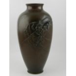 A Japanese Meiji bronze baluster vase, moulded with Raijin to one side, H.36cm