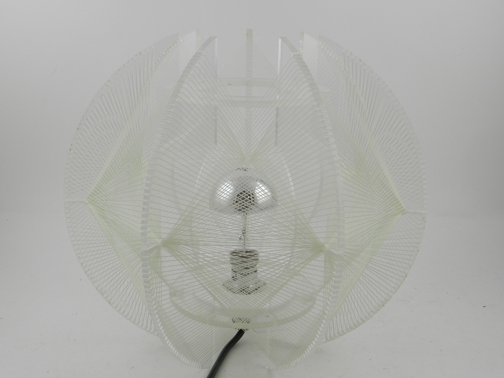 An unusual modernist perspex and nylon table lamp. H.28cm