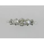 A 9 carat white gold five stone diamond