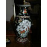 A Chinese famille noir porcelain table l