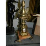 A regency style lamp base, gilt metal in