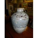 An 18th century Middle Eastern Iznik style baluster vase, brown painted on a grey glazed ground, H.