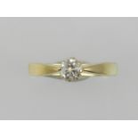 A Victorian yellow gold solitaire diamon