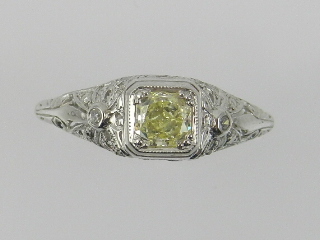 A Belle Epoque style platinum diamond ri