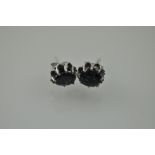 A pair of sapphire ear studs in white metal, stamped 9ct, 1.5g.