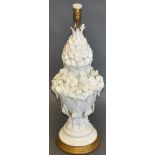 A large blanc de chine table lamp, of urn form with foliate decoration, H. 75cm.