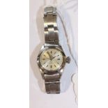 A Tudor Oyster stainless steel ladies' wristwatch, the silvered dial with baton numerals, on a