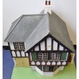 A inter-war period doll's house circa 1932-36, Lines Bros./Tri-ang, No. 71 (Half Stockbroker), the