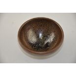 An oil drop glaze tea bowl, D. 9cm.
